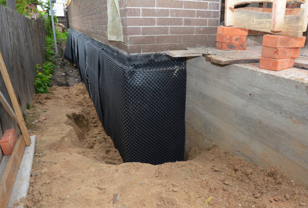 Happy homeowners after waterproofing job in Servia